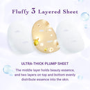 Gold face mask with text describing its three-layered structure and ultra-thick plump design.