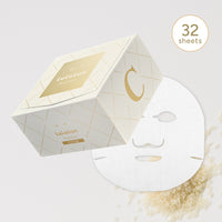 White face mask sheet with packaging and '32 sheets' text on a light gray background